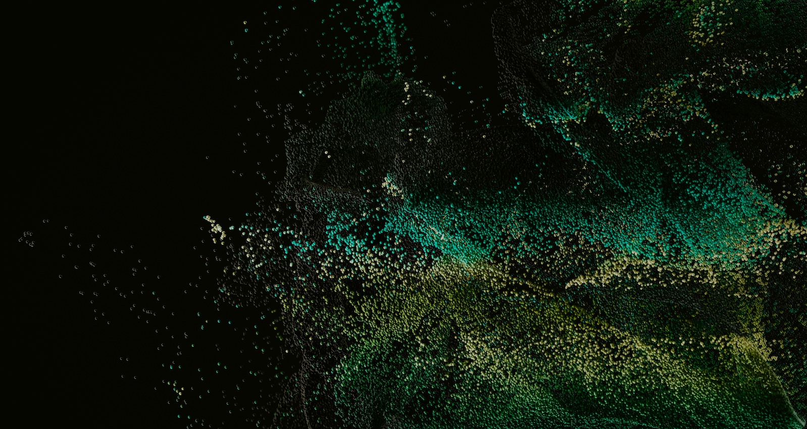 A spray of dots in various shades of green and blue in wave-like pattern against a black background