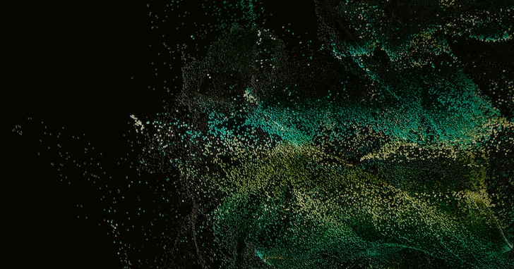 A spray of dots in various shades of green and blue in wave-like pattern against a black background