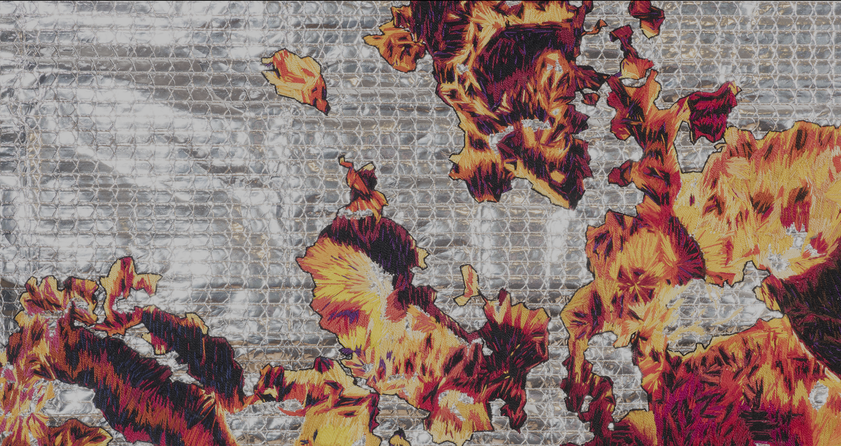 Artistic representation of fire in gray, red, and yellow colors
